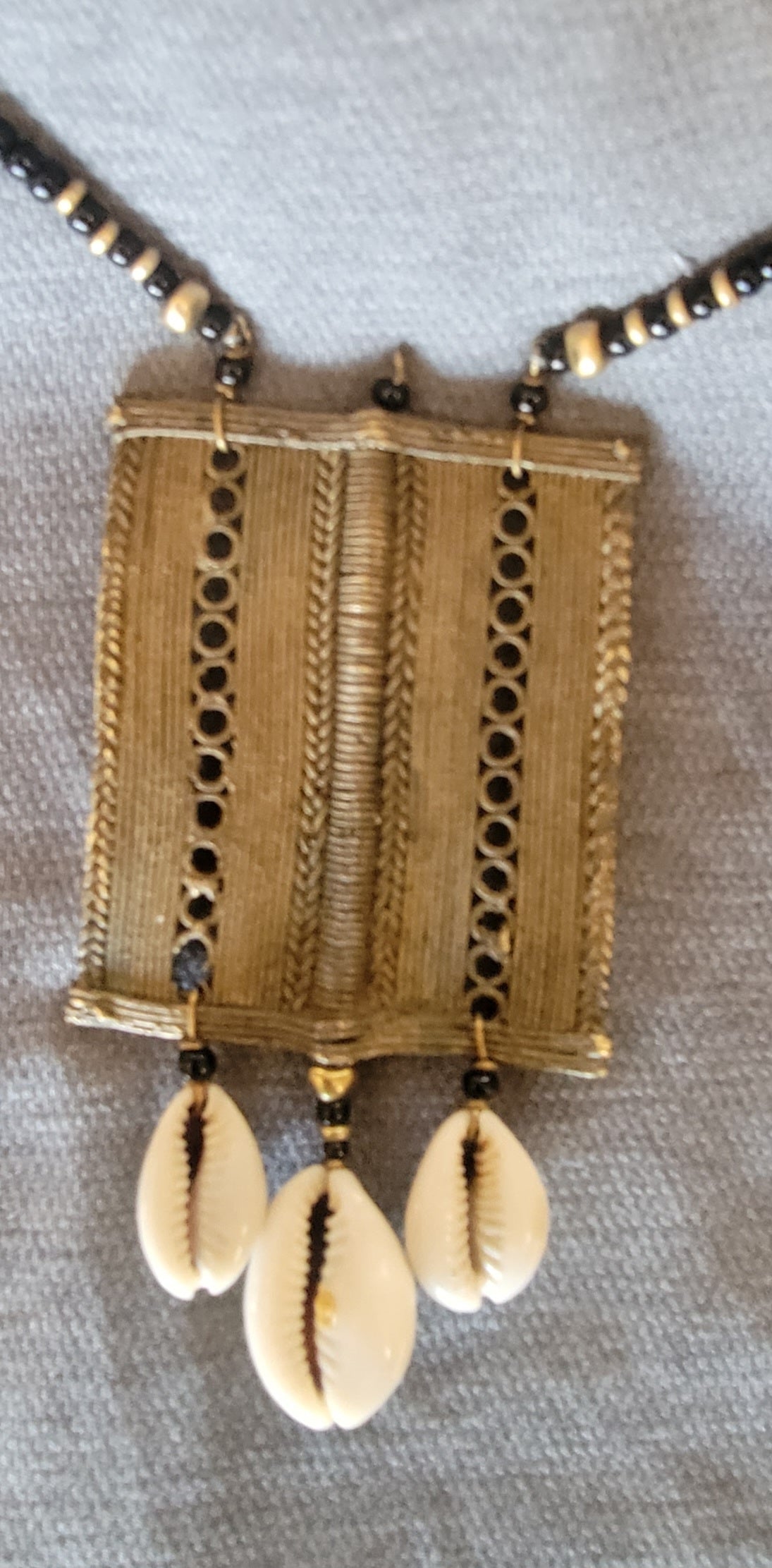 Baule Pendent with Cowrie Shell Necklace