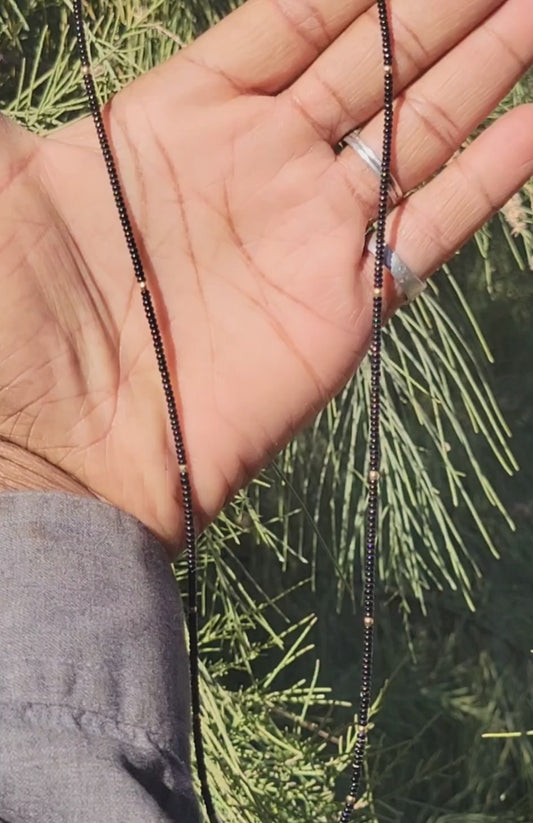 Sugilite with amethyst gold-filled and glass beads